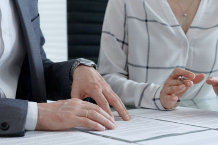Business people reviewing documents